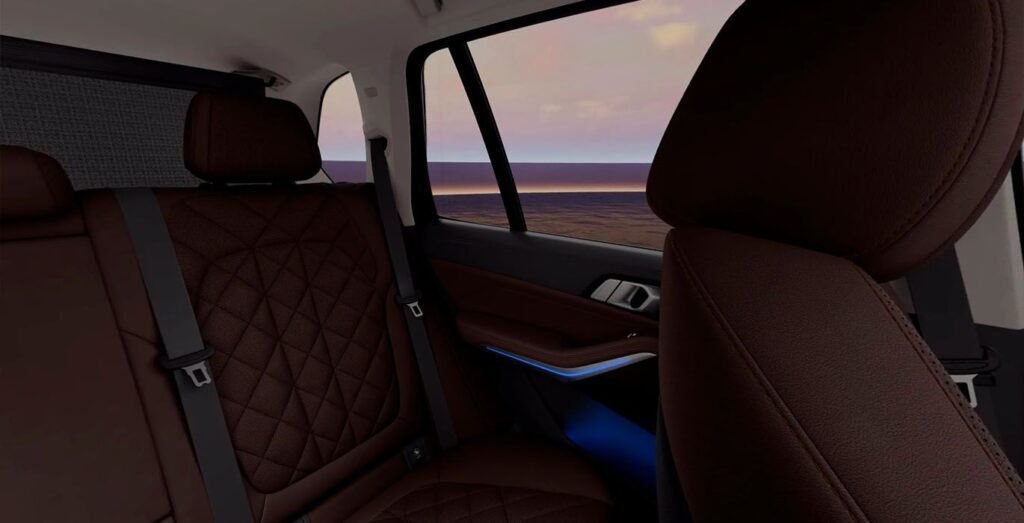 Interior trasero del BMW X5 xDrive30d con asientos de cuero y acabados premium