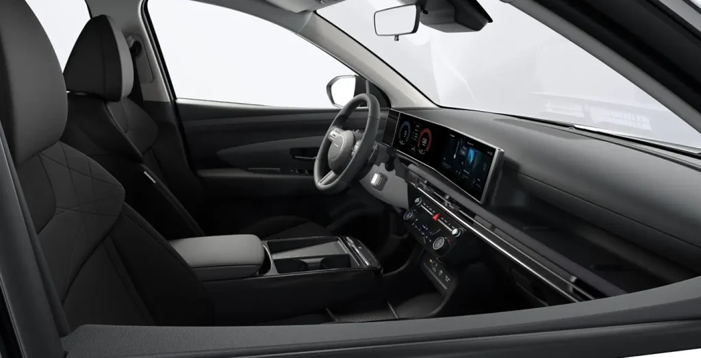 Interior negro Hyundai Tucson 1.6T 239 CV híbrido vista delantera
